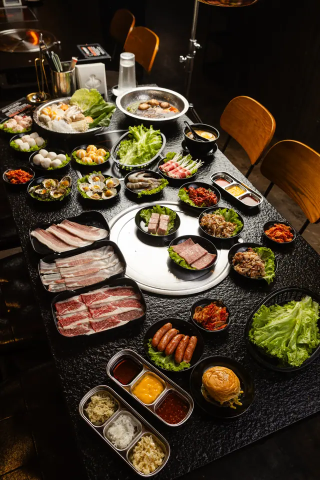 A full grill table spread seen from above