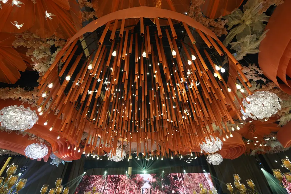A dome of hanging strands and lights over the dance floor